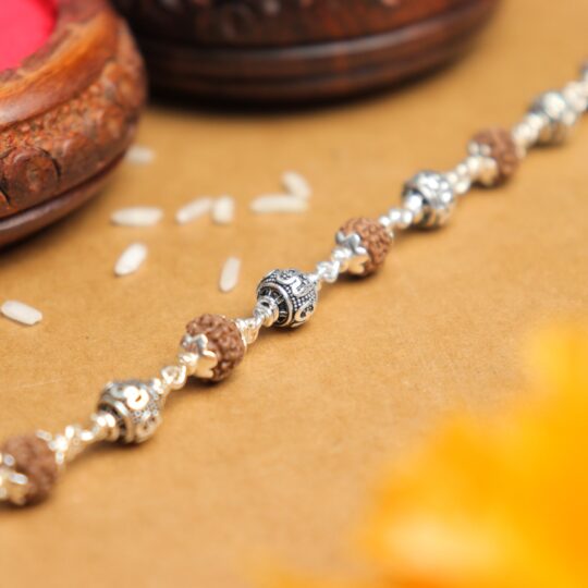 Prinjal Jewellers Silver Rakhi with Rudraksha and Om Beads